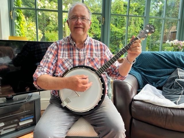 Andy Keith playing a rioga maple leaf tenor banjo