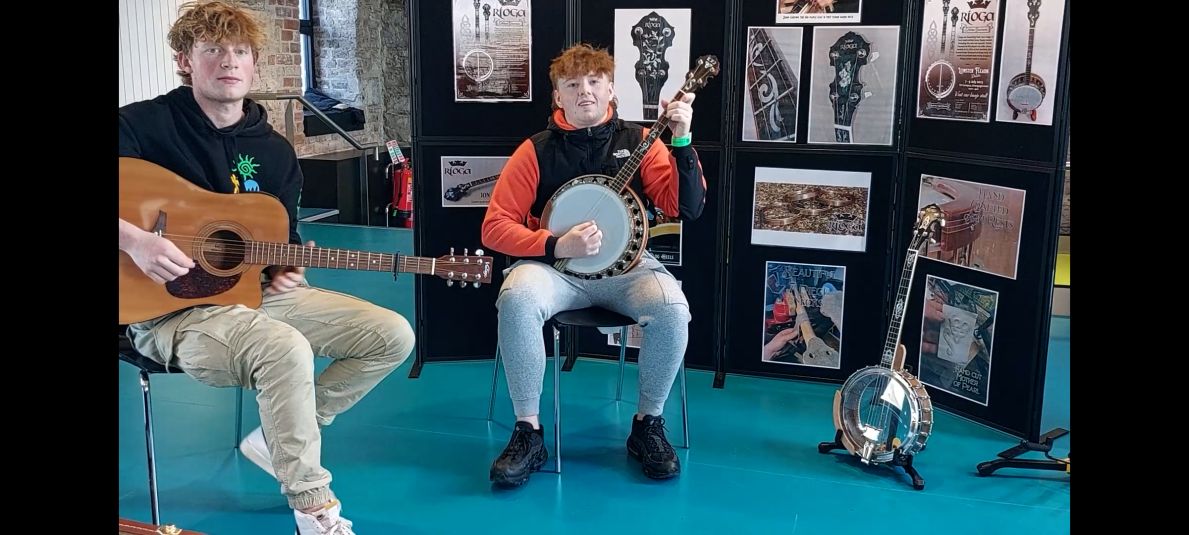 Ciaran & Tiernan trying out the Rioga Banjos at the Leinster Fleadh 2023